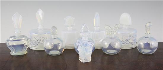 Ten assorted French Sabino blue tinted glass scent bottles with stoppers, 5.25in et infra.